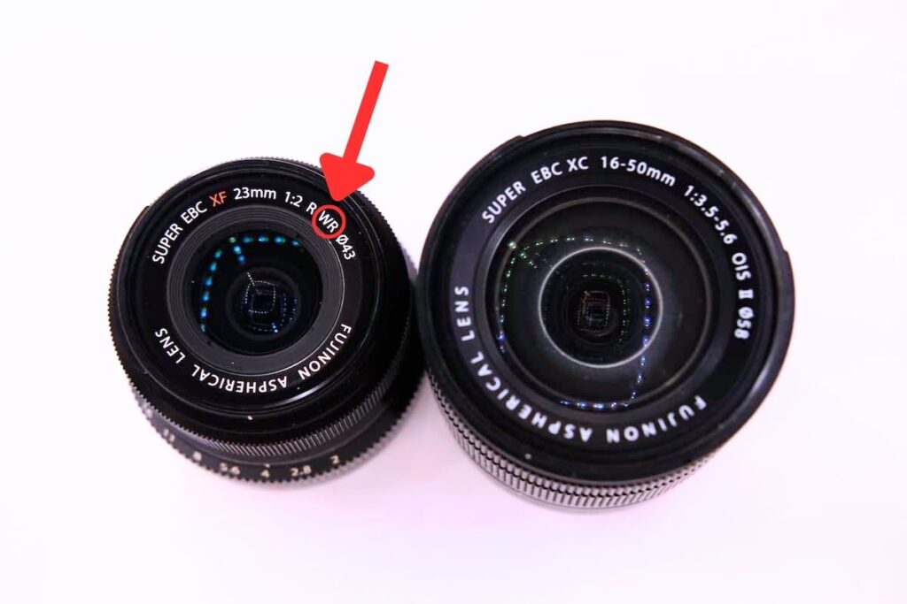 Fujifilm XF23mmF2 WR lens next to Fujifilm XC16-50mmF3.5-5.6 lens.jpg