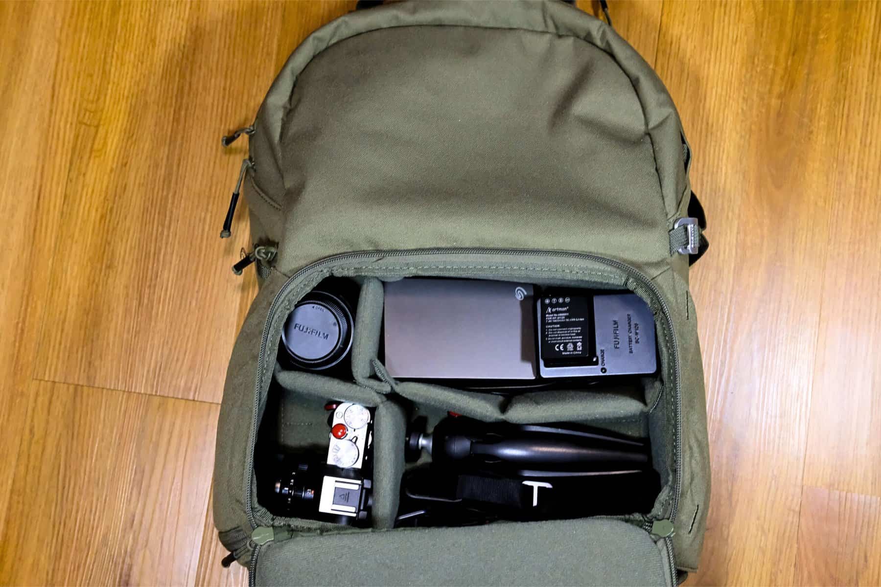 camera traveling kit packed in backpack